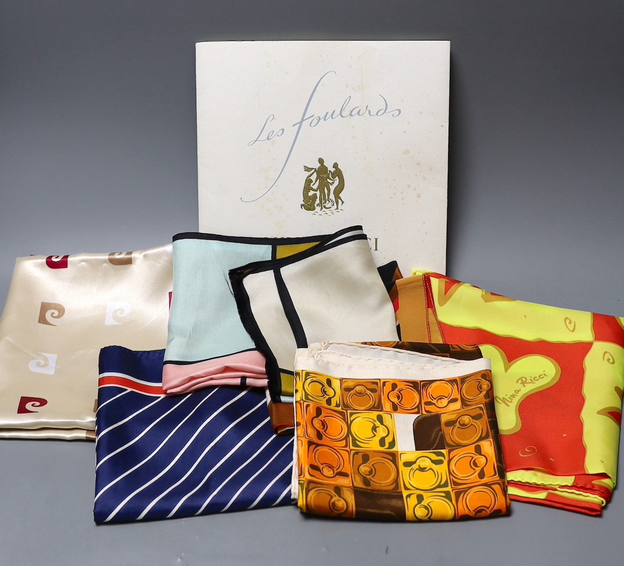 A selection of women's silk scarves, to include Celine, Nina Ricci, Pierre Cardin and others